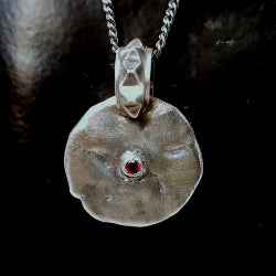 MOON PENDANT IN SILVER WITH SINGLE RHODALITE GARNET
