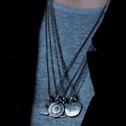 MOON PENDANT IN SILVER WITH RHODALITE