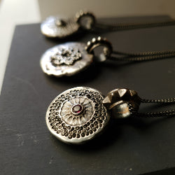 MOON PENDANT IN SILVER WITH BLACK SPINEL