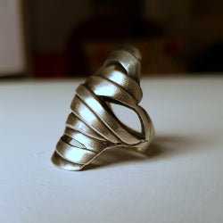 Gorgeous wrap over silver ring with multiple cut outs over the top