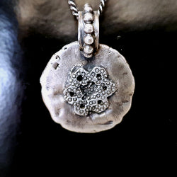 MOON PENDANT IN SILVER WITH STYLISED FLOWER