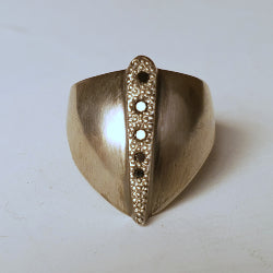 sterling silver thumb ring set with 5 black diamonds on the central raised strip
