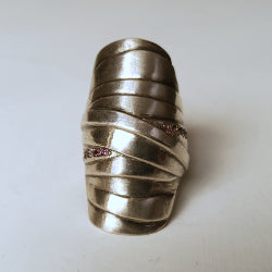 Wrapped silver ring, statement pieces measuring 38mm long and set with rhodalite garnet along one cross over piece